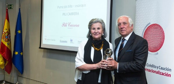 Pilar Rodríguez, fundadora de Pili Carrera, junto a Carlos Espinosa de los Monteros, Alto Comisionado del Gobierno para la Marca España.